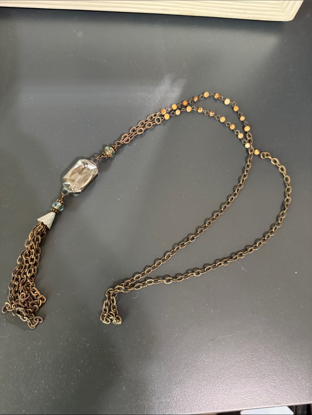 Antique Gold-Tone Tassel Necklace with Smoky Crystal Pendant